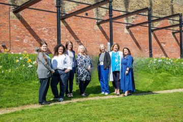 Picture of the Breathing Space team outside with daffodils